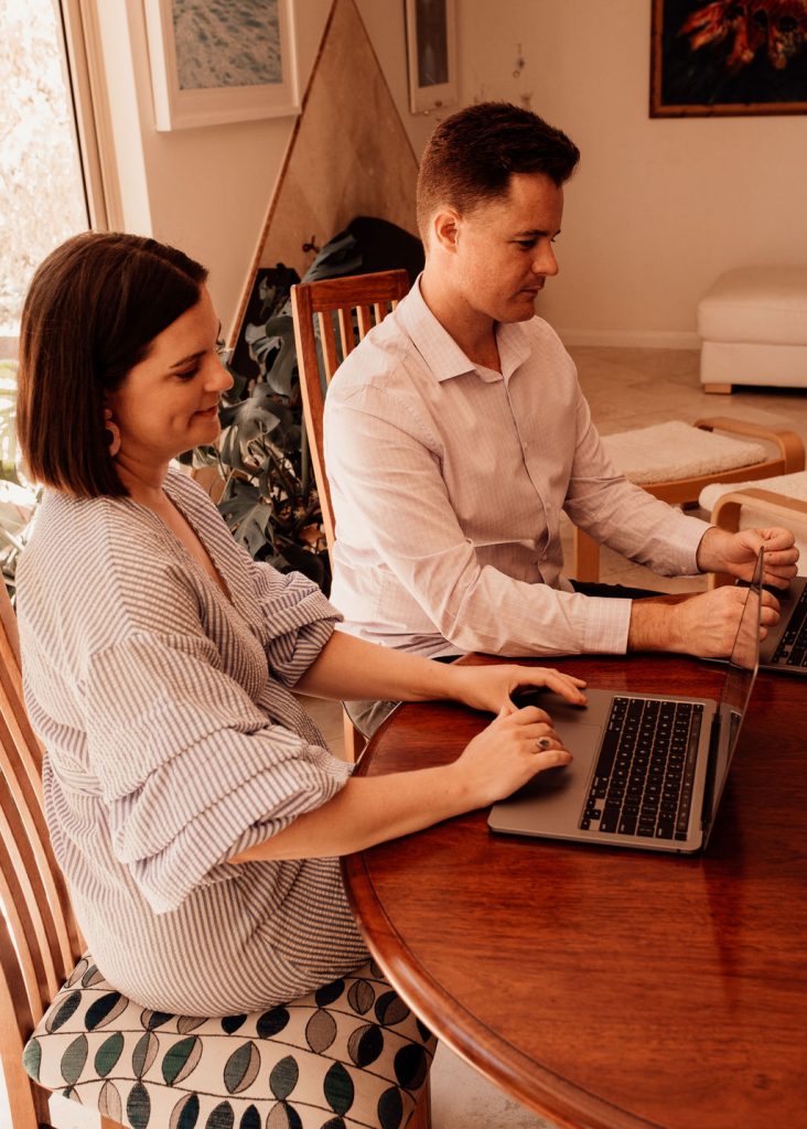 Carmen and David emailing from the dining room table